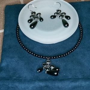 Black set of earrings and necklace